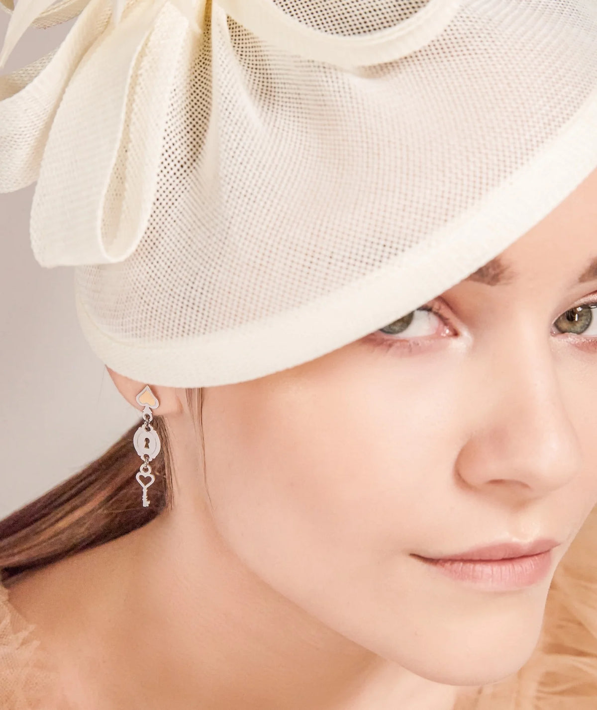 Orecchini in acciaio Mad Tea collezione Alice in Wonderland-CAWO001