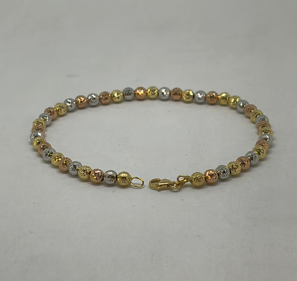 Bracciale in oro 750/1000 - 18 carati colore giallo, bianco e rosa - 19 centimetri - BO015